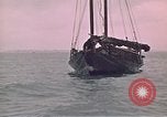 Image of junk or Chinese vessel Southeast Asia, 1962, second 22 stock footage video 65675039900