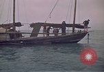 Image of junk or Chinese vessel Southeast Asia, 1962, second 48 stock footage video 65675039900