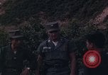 Image of ARVN officer and U.S. Adviser question Vietcong prisoner in Tuy Hoa, S Tuy Hoa South Vietnam, 1962, second 8 stock footage video 65675039921