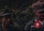 Image of ARVN officer and U.S. Adviser question Vietcong prisoner in Tuy Hoa, S Tuy Hoa South Vietnam, 1962, second 23 stock footage video 65675039921