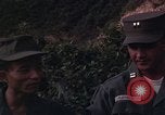 Image of ARVN officer and U.S. Adviser question Vietcong prisoner in Tuy Hoa, S Tuy Hoa South Vietnam, 1962, second 25 stock footage video 65675039921