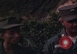 Image of ARVN officer and U.S. Adviser question Vietcong prisoner in Tuy Hoa, S Tuy Hoa South Vietnam, 1962, second 26 stock footage video 65675039921