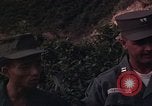 Image of ARVN officer and U.S. Adviser question Vietcong prisoner in Tuy Hoa, S Tuy Hoa South Vietnam, 1962, second 27 stock footage video 65675039921