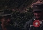 Image of ARVN officer and U.S. Adviser question Vietcong prisoner in Tuy Hoa, S Tuy Hoa South Vietnam, 1962, second 28 stock footage video 65675039921