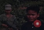 Image of ARVN officer and U.S. Adviser question Vietcong prisoner in Tuy Hoa, S Tuy Hoa South Vietnam, 1962, second 37 stock footage video 65675039921
