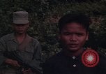 Image of ARVN officer and U.S. Adviser question Vietcong prisoner in Tuy Hoa, S Tuy Hoa South Vietnam, 1962, second 39 stock footage video 65675039921