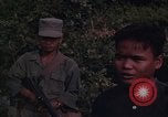 Image of ARVN officer and U.S. Adviser question Vietcong prisoner in Tuy Hoa, S Tuy Hoa South Vietnam, 1962, second 46 stock footage video 65675039921