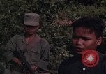 Image of ARVN officer and U.S. Adviser question Vietcong prisoner in Tuy Hoa, S Tuy Hoa South Vietnam, 1962, second 51 stock footage video 65675039921