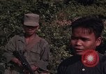 Image of ARVN officer and U.S. Adviser question Vietcong prisoner in Tuy Hoa, S Tuy Hoa South Vietnam, 1962, second 54 stock footage video 65675039921