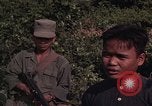 Image of ARVN officer and U.S. Adviser question Vietcong prisoner in Tuy Hoa, S Tuy Hoa South Vietnam, 1962, second 55 stock footage video 65675039921