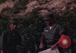Image of ARVN officer and U.S. Adviser question Vietcong prisoner in Tuy Hoa, S Tuy Hoa South Vietnam, 1962, second 57 stock footage video 65675039921