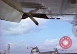 Image of catapult crew prepares to launch aircraft aboard USS Essex (CVA-9) dur Vietnam, 1958, second 3 stock footage video 65675039925