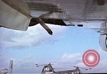 Image of catapult crew prepares to launch aircraft aboard USS Essex (CVA-9) dur Vietnam, 1958, second 4 stock footage video 65675039925