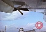 Image of catapult crew prepares to launch aircraft aboard USS Essex (CVA-9) dur Vietnam, 1958, second 6 stock footage video 65675039925