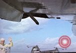 Image of catapult crew prepares to launch aircraft aboard USS Essex (CVA-9) dur Vietnam, 1958, second 8 stock footage video 65675039925