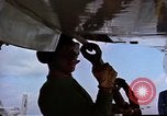 Image of catapult crew prepares to launch aircraft aboard USS Essex (CVA-9) dur Vietnam, 1958, second 13 stock footage video 65675039925