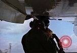 Image of catapult crew prepares to launch aircraft aboard USS Essex (CVA-9) dur Vietnam, 1958, second 20 stock footage video 65675039925