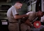 Image of catapult crew prepares to launch aircraft aboard USS Essex (CVA-9) dur Vietnam, 1958, second 37 stock footage video 65675039925