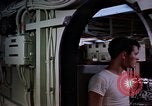 Image of catapult crew prepares to launch aircraft aboard USS Essex (CVA-9) dur Vietnam, 1958, second 47 stock footage video 65675039925