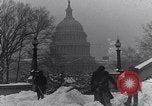 Image of Shoveling and playing in snow Washington DC USA, 1923, second 5 stock footage video 65675040078
