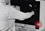 Image of Prince Philip, Duke of Edinburgh, visiting the Decca Records productio United Kingdom, 1957, second 21 stock footage video 65675040118