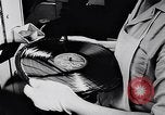 Image of Prince Philip, Duke of Edinburgh, visiting the Decca Records productio United Kingdom, 1957, second 23 stock footage video 65675040118