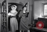 Image of women wear hood Avon Connecticut USA, 1953, second 35 stock footage video 65675040155