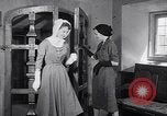 Image of women wear hood Avon Connecticut USA, 1953, second 37 stock footage video 65675040155