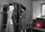 Image of women wear hood Avon Connecticut USA, 1953, second 38 stock footage video 65675040155