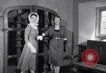 Image of women wear hood Avon Connecticut USA, 1953, second 40 stock footage video 65675040155