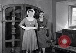 Image of women wear hood Avon Connecticut USA, 1953, second 41 stock footage video 65675040155