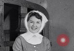 Image of women wear hood Avon Connecticut USA, 1953, second 42 stock footage video 65675040155