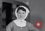 Image of women wear hood Avon Connecticut USA, 1953, second 44 stock footage video 65675040155