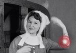 Image of women wear hood Avon Connecticut USA, 1953, second 46 stock footage video 65675040155