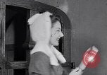 Image of women wear hood Avon Connecticut USA, 1953, second 48 stock footage video 65675040155