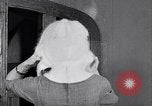 Image of women wear hood Avon Connecticut USA, 1953, second 49 stock footage video 65675040155
