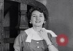 Image of women wear hood Avon Connecticut USA, 1953, second 53 stock footage video 65675040155