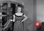 Image of women wear hood Avon Connecticut USA, 1953, second 59 stock footage video 65675040155