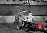 Image of women wear hood Avon Connecticut USA, 1953, second 61 stock footage video 65675040155