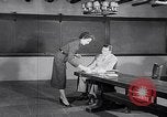 Image of women wear hood Avon Connecticut USA, 1953, second 62 stock footage video 65675040155