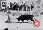 Image of bull fighting Alcochete Portugal, 1953, second 20 stock footage video 65675040157