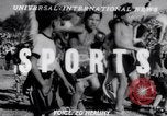 Image of cowboys at rodeo Pendleton Oregon USA, 1953, second 1 stock footage video 65675040164