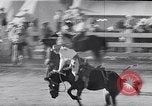 Image of cowboys at rodeo Pendleton Oregon USA, 1953, second 22 stock footage video 65675040164