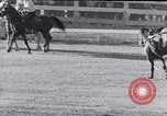 Image of cowboys at rodeo Pendleton Oregon USA, 1953, second 24 stock footage video 65675040164