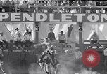 Image of cowboys at rodeo Pendleton Oregon USA, 1953, second 28 stock footage video 65675040164