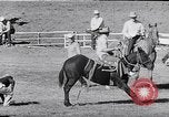 Image of cowboys at rodeo Pendleton Oregon USA, 1953, second 36 stock footage video 65675040164