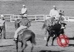 Image of cowboys at rodeo Pendleton Oregon USA, 1953, second 38 stock footage video 65675040164