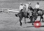 Image of cowboys at rodeo Pendleton Oregon USA, 1953, second 40 stock footage video 65675040164