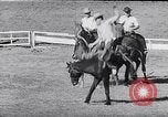 Image of cowboys at rodeo Pendleton Oregon USA, 1953, second 41 stock footage video 65675040164