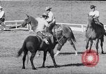 Image of cowboys at rodeo Pendleton Oregon USA, 1953, second 43 stock footage video 65675040164